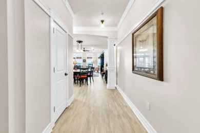 Welcome Home to your exquisite lakefront coastal oasis!  Wild on Sharks Tooth Golf Club in Florida - for sale on GolfHomes.com, golf home, golf lot