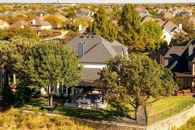 This is more than an upgraded home--it's a masterpiece of modern on The Trails of Frisco Golf Club in Texas - for sale on GolfHomes.com, golf home, golf lot