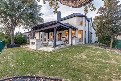 This is more than an upgraded home--it's a masterpiece of modern on The Trails of Frisco Golf Club in Texas - for sale on GolfHomes.com, golf home, golf lot