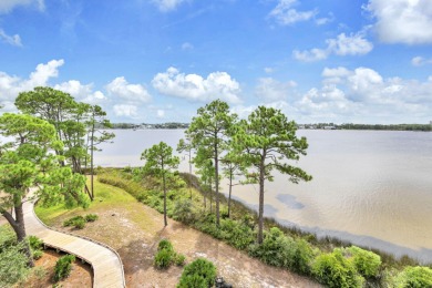 Welcome Home to your exquisite lakefront coastal oasis!  Wild on Sharks Tooth Golf Club in Florida - for sale on GolfHomes.com, golf home, golf lot