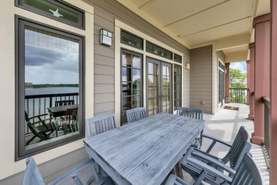 Welcome Home to your exquisite lakefront coastal oasis!  Wild on Sharks Tooth Golf Club in Florida - for sale on GolfHomes.com, golf home, golf lot