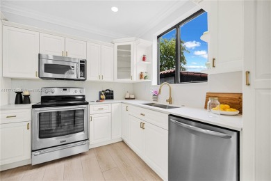 Stunningly renovated 3-bedroom, 3-bathroom home located in the on Normandy Shores Golf Course in Florida - for sale on GolfHomes.com, golf home, golf lot