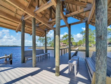 Welcome Home to your exquisite lakefront coastal oasis!  Wild on Sharks Tooth Golf Club in Florida - for sale on GolfHomes.com, golf home, golf lot
