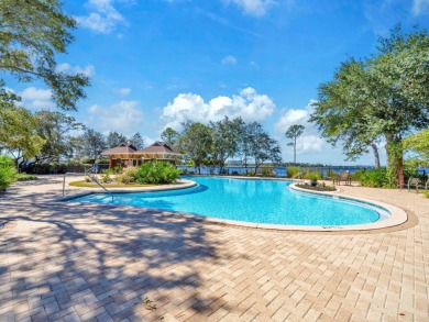 Welcome Home to your exquisite lakefront coastal oasis!  Wild on Sharks Tooth Golf Club in Florida - for sale on GolfHomes.com, golf home, golf lot