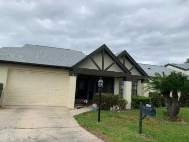 BEAUTIFUL NEW FRONT DOORS, FORMAL LIVING ROOM, DINING ROOM on Highland Lakes Executive Golf Course in Florida - for sale on GolfHomes.com, golf home, golf lot