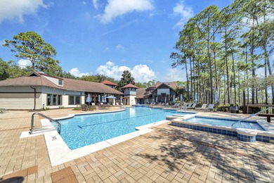 Welcome Home to your exquisite lakefront coastal oasis! Wild on Sharks Tooth Golf Club in Florida - for sale on GolfHomes.com, golf home, golf lot