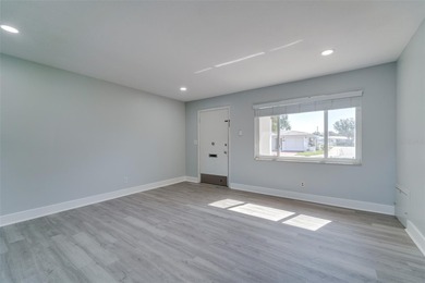 Your slice of Waterfront Paradise:  Experience the ultimate on Mainlands Golf Club in Florida - for sale on GolfHomes.com, golf home, golf lot