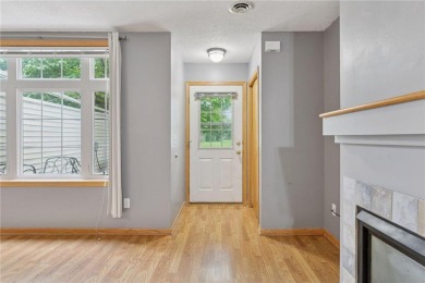 Move-in ready interior townhome. Main floor features living room on Chomonix Golf Course in Minnesota - for sale on GolfHomes.com, golf home, golf lot
