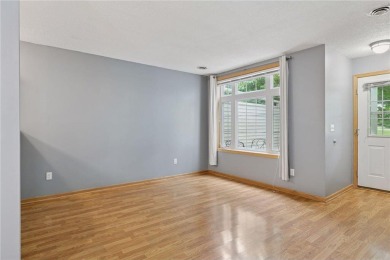 Move-in ready interior townhome. Main floor features living room on Chomonix Golf Course in Minnesota - for sale on GolfHomes.com, golf home, golf lot