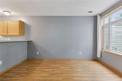 Move-in ready interior townhome. Main floor features living room on Chomonix Golf Course in Minnesota - for sale on GolfHomes.com, golf home, golf lot