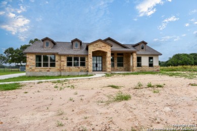 Magnificent custom home with oversized lot on the golf course in on Devine Golf Course in Texas - for sale on GolfHomes.com, golf home, golf lot