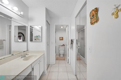 Oversized 2/2 on 4th Floor in Century Village a 55+ Community on Flamingo Lakes Country Club in Florida - for sale on GolfHomes.com, golf home, golf lot
