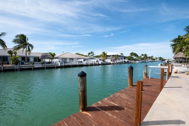 This waterfront half duplex is now available to purchase, or on Key Colony Beach Golf Course in Florida - for sale on GolfHomes.com, golf home, golf lot