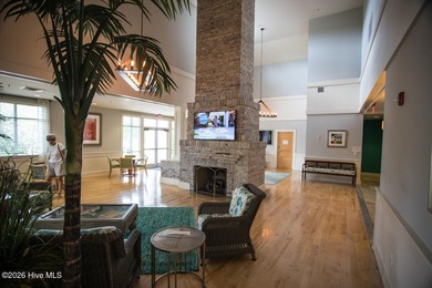 Enjoy easy, single-level, maintenance-free living in this on Cape Fear National At Brunswick Forest in North Carolina - for sale on GolfHomes.com, golf home, golf lot