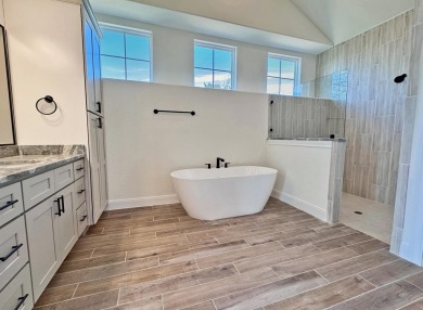 This stunning three-bedroom, three-and-a-half-bath new on Escondido Golf and Lake Club  in Texas - for sale on GolfHomes.com, golf home, golf lot