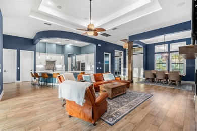 Welcome to 25870 Crossings Bluff Lane-- an exceptional luxury on Red Tail Golf Club in Florida - for sale on GolfHomes.com, golf home, golf lot