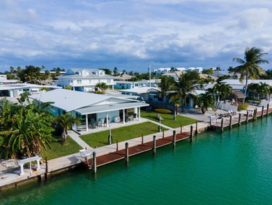This waterfront half duplex is now available to purchase, or on Key Colony Beach Golf Course in Florida - for sale on GolfHomes.com, golf home, golf lot