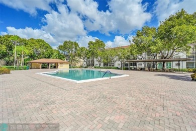 Oversized 2/2 on 4th Floor in Century Village a 55+ Community on Flamingo Lakes Country Club in Florida - for sale on GolfHomes.com, golf home, golf lot