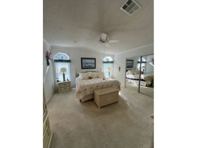 The home has over 1600 sq ft of living space with 2 huge on Hamptons Golf Club in Florida - for sale on GolfHomes.com, golf home, golf lot