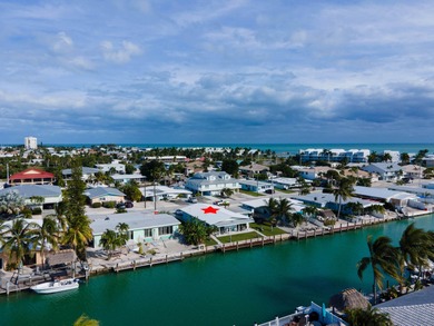 This waterfront half duplex is now available to purchase, or on Key Colony Beach Golf Course in Florida - for sale on GolfHomes.com, golf home, golf lot
