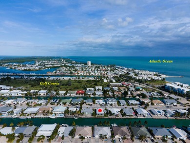 This waterfront half duplex is now available to purchase, or on Key Colony Beach Golf Course in Florida - for sale on GolfHomes.com, golf home, golf lot