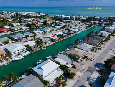 This waterfront half duplex is now available to purchase, or on Key Colony Beach Golf Course in Florida - for sale on GolfHomes.com, golf home, golf lot