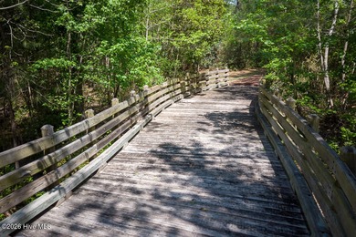Enjoy easy, single-level, maintenance-free living in this on Cape Fear National At Brunswick Forest in North Carolina - for sale on GolfHomes.com, golf home, golf lot