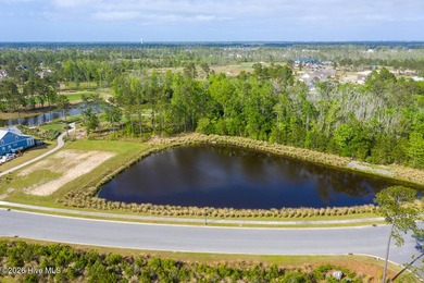 Enjoy easy, single-level, maintenance-free living in this on Cape Fear National At Brunswick Forest in North Carolina - for sale on GolfHomes.com, golf home, golf lot