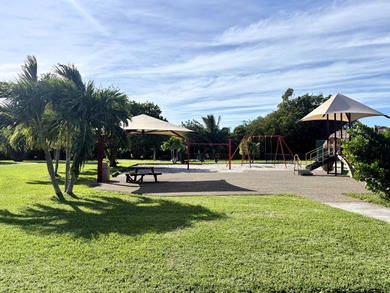 This waterfront half duplex is now available to purchase, or on Key Colony Beach Golf Course in Florida - for sale on GolfHomes.com, golf home, golf lot