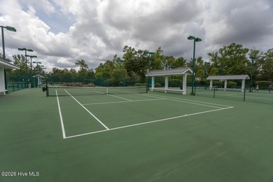 Enjoy easy, single-level, maintenance-free living in this on Cape Fear National At Brunswick Forest in North Carolina - for sale on GolfHomes.com, golf home, golf lot