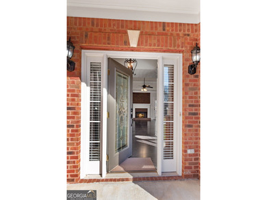 Discover this exquisite sprawling ranch home in the highly on Canongate At Georgia National Golf Club in Georgia - for sale on GolfHomes.com, golf home, golf lot