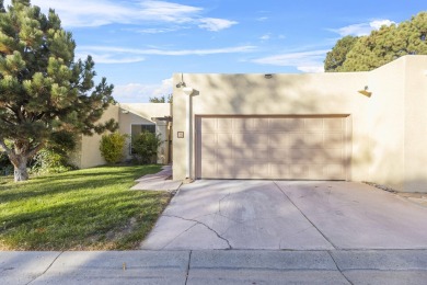 Discover this easy-to-maintain 2-bedroom, 2-bathroom patio home on Arroyo Del Oso Golf Course in New Mexico - for sale on GolfHomes.com, golf home, golf lot