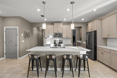 Don't miss this stunning 5-bedroom, 4.5-bath home offering over on The Oasis Club at Champions Gate in Florida - for sale on GolfHomes.com, golf home, golf lot