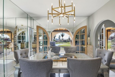 Discover luxury living with stunning mountain, lake, pond, and on London Bridge Golf Course in Arizona - for sale on GolfHomes.com, golf home, golf lot