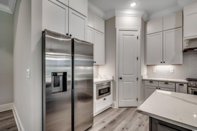 Discover an exquisite blend of style and modern convenience at on Wild Wing Plantation in South Carolina - for sale on GolfHomes.com, golf home, golf lot