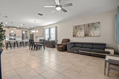 Don't miss this stunning 5-bedroom, 4.5-bath home offering over on The Oasis Club at Champions Gate in Florida - for sale on GolfHomes.com, golf home, golf lot