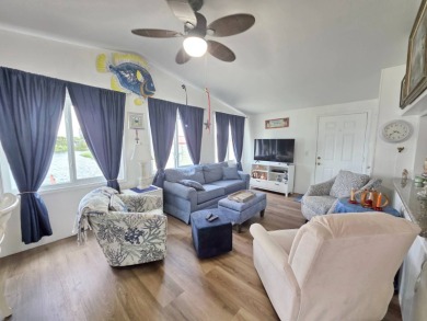 Blue Cypress - 2/2 Updated well-maintained home and spacious on Blue Cypress Golf and RV Resort in Florida - for sale on GolfHomes.com, golf home, golf lot