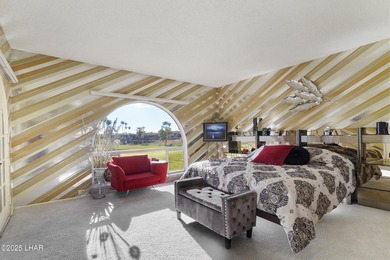 Discover luxury living with stunning mountain, lake, pond, and on London Bridge Golf Course in Arizona - for sale on GolfHomes.com, golf home, golf lot