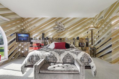 Discover luxury living with stunning mountain, lake, pond, and on London Bridge Golf Course in Arizona - for sale on GolfHomes.com, golf home, golf lot