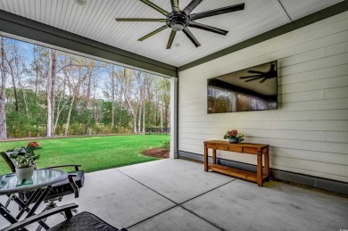 Discover an exquisite blend of style and modern convenience at on Wild Wing Plantation in South Carolina - for sale on GolfHomes.com, golf home, golf lot
