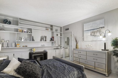 Discover luxury living with stunning mountain, lake, pond, and on London Bridge Golf Course in Arizona - for sale on GolfHomes.com, golf home, golf lot