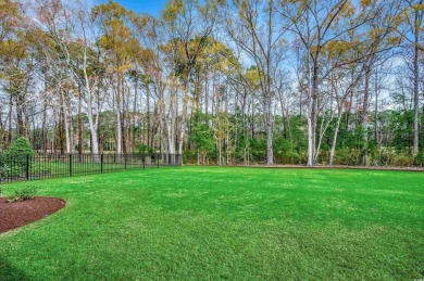 Discover an exquisite blend of style and modern convenience at on Wild Wing Plantation in South Carolina - for sale on GolfHomes.com, golf home, golf lot