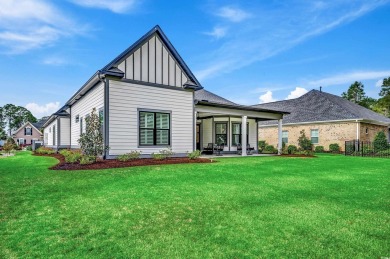Discover an exquisite blend of style and modern convenience at on Wild Wing Plantation in South Carolina - for sale on GolfHomes.com, golf home, golf lot