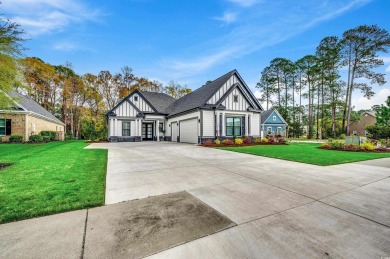 Discover an exquisite blend of style and modern convenience at on Wild Wing Plantation in South Carolina - for sale on GolfHomes.com, golf home, golf lot