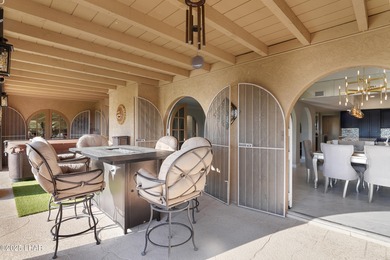 Discover luxury living with stunning mountain, lake, pond, and on London Bridge Golf Course in Arizona - for sale on GolfHomes.com, golf home, golf lot