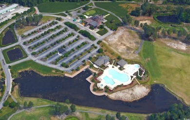 Discover an exquisite blend of style and modern convenience at on Wild Wing Plantation in South Carolina - for sale on GolfHomes.com, golf home, golf lot