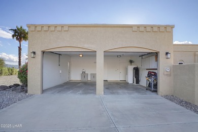 Discover luxury living with stunning mountain, lake, pond, and on London Bridge Golf Course in Arizona - for sale on GolfHomes.com, golf home, golf lot