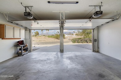 Discover luxury living with stunning mountain, lake, pond, and on London Bridge Golf Course in Arizona - for sale on GolfHomes.com, golf home, golf lot