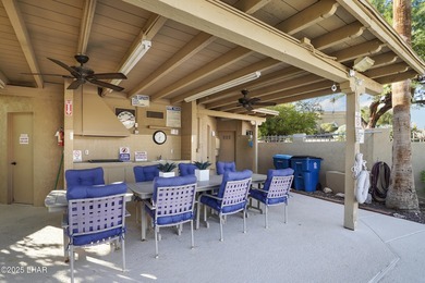 Discover luxury living with stunning mountain, lake, pond, and on London Bridge Golf Course in Arizona - for sale on GolfHomes.com, golf home, golf lot