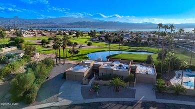 Discover luxury living with stunning mountain, lake, pond, and on London Bridge Golf Course in Arizona - for sale on GolfHomes.com, golf home, golf lot